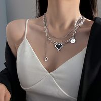 Korean Retro Heart Dyed Black Stacked Thollow Design English Collarbone Chain Female main image 4
