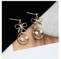 Fashion Geometric Solid Color Hollow Bow Pearl Earrings main image 4