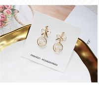 Fashion Geometric Solid Color Hollow Bow Pearl Earrings main image 6