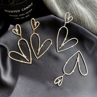 Simple Geometric Exaggerated Double Heart Metal Earrings main image 1