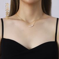 Light Luxury Niche Matching Imitation Baroque Pearl Titanium Steel Necklace Female Wholesale main image 3