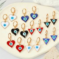 Retro Ethnic Style Color Dripping Oil Triangle Heart Eye Earrings main image 1