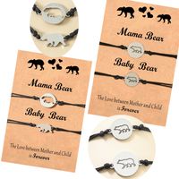 Creative Stainless Steel Hollow Black Label Baby Bear Parent-child Card Hand-woven Bracelet main image 1