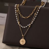 2022 New Creative Simple Women's Portrait Coin Chain Pearl Three-layer Necklace Wholesale main image 3