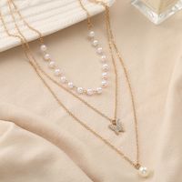 2022 New Creative Simple Pearl Diamond Butterfly Pendant Three Layer Necklace main image 3