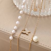 2022 New Creative Simple Pearl Diamond Butterfly Pendant Three Layer Necklace main image 5
