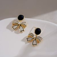 Fashion Bow Knot Alloy Inlay Artificial Pearls Rhinestones Women's Drop Earrings 1 Pair main image 6