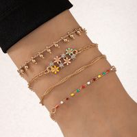 New Simple Trend Diamond-studded Color Drip Oil Flower Tassel Four-piece Bracelet main image 1