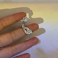 Moda Mariposa Aleación Borla Enchapado Embutido Diamantes De Imitación Perla Mujeres Pinzas Para Las Orejas 1 Pieza sku image 2
