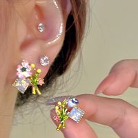 Sweet Geometric Butterfly Bow Knot Imitation Pearl Alloy Inlay Rhinestones Women's Earrings 1 Pair main image 4