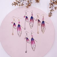 Sweet Wings Alloy Plastic Asymmetrical Rhinestones Women's Drop Earrings 1 Pair main image 4