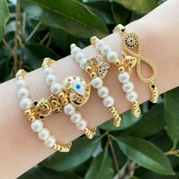 Vintage Style Eye Tiger Butterfly Copper Gold Plated Artificial Pearls Zircon Bracelets 1 Piece main image 1