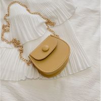 Women's Mini Pu Leather Solid Color Streetwear Oval Flip Cover Crossbody Bag sku image 2