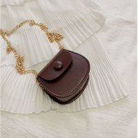 Women's Mini Pu Leather Solid Color Streetwear Oval Flip Cover Crossbody Bag sku image 6