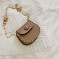 Women's Mini Pu Leather Solid Color Streetwear Oval Flip Cover Crossbody Bag sku image 5