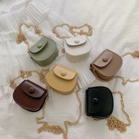 Women's Mini Pu Leather Solid Color Streetwear Oval Flip Cover Crossbody Bag main image 1