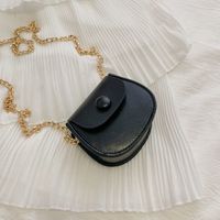 Women's Mini Pu Leather Solid Color Streetwear Oval Flip Cover Crossbody Bag sku image 4