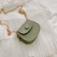 Women's Mini Pu Leather Solid Color Streetwear Oval Flip Cover Crossbody Bag sku image 3