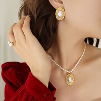 Retro Oval Titanium Steel Inlay Artificial Pearls Earrings Necklace main image 1