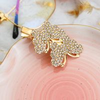 Moda Estrella Nudo De Lazo Metal Embutido Diamantes De Imitación Perla Pinza Para El Cabello 1 Pieza sku image 4