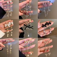 Fashion Tassel Heart Shape Bow Knot Imitation Pearl Copper Inlay Rhinestones Drop Earrings 1 Pair main image 4