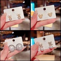 1 Pair Fashion Heart Shape Butterfly Bow Knot Inlay Imitation Pearl Alloy Rhinestones Earrings main image 2