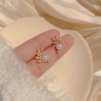 Elegant Leaf Metal Plating Artificial Pearls Women's Ear Studs 1 Pair main image 1