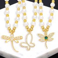 Simple Style Dragonfly Butterfly Imitation Pearl Copper Beaded Gold Plated Zircon Pendant Necklace 1 Piece main image 1