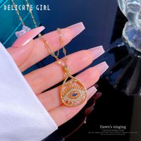 Ethnic Style Water Droplets Eye Titanium Steel Copper Plating Hollow Out Inlay Zircon Pendant Necklace main image 5