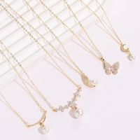 Classic Style Moon Flower Butterfly Copper Gold Plated Artificial Pearls Zircon Pendant Necklace 1 Piece main image 1