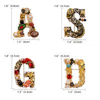 Fashion Letter Rhinestone Inlay Artificial Pearls Unisex Brooches main image 2
