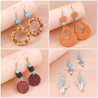 Retro Round Cattle Leopard Alloy Wood Inlay Turquoise Women's Drop Earrings 1 Pair main image 1
