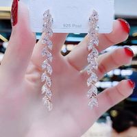 Estilo Coreano Nudo De Lazo Aleación Enchapado Diamantes De Imitación Perla Mujeres Aretes 1 Par sku image 34