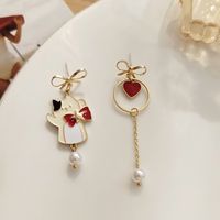 Fashion Heart Shape Cat Bow Knot Alloy Plating Artificial Pearls Women's Drop Earrings 1 Pair main image 4