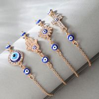Fashion Cross Devil's Eye Alloy Inlay Artificial Gemstones Women's Bracelets 1 Piece main image 1