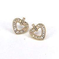 Fashion Heart Shape Gold Plated Hollow Out Artificial Rhinestones Women's Ear Studs 1 Pair main image 5