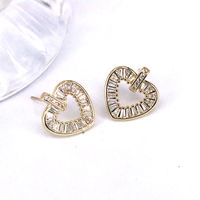 Fashion Heart Shape Gold Plated Hollow Out Artificial Rhinestones Women's Ear Studs 1 Pair main image 6
