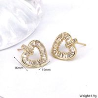 Fashion Heart Shape Gold Plated Hollow Out Artificial Rhinestones Women's Ear Studs 1 Pair main image 4