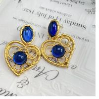 Retro Heart Shape Alloy Plating Hollow Out Inlay Artificial Gemstones Women's Drop Earrings 1 Pair main image 1