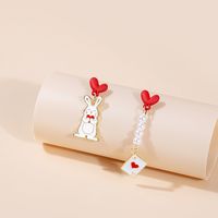 1 Pair Cartoon Style Rabbit Dinosaur Heart Shape Enamel Alloy Artificial Pearls Drop Earrings sku image 3