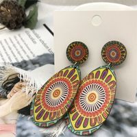 Ethnic Style Round Water Droplets Flower Wood Stoving Varnish Women's Drop Earrings 1 Pair main image 1
