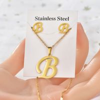 Mode Lettre Acier Au Titane Placage Femmes Des Boucles D'oreilles Collier 1 Jeu sku image 2