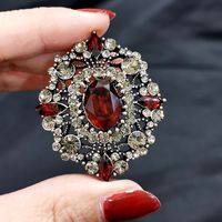 Simple Style Oval Alloy Plating Hollow Out Inlay Artificial Gemstones Women's Brooches 1 Piece main image 3