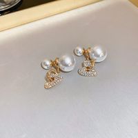 Retro Geométrico Perla De Imitación Aleación Diamante De Imitación Borla Mujeres Pendientes De Gota 1 Par sku image 10