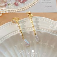 Retro Heart Shape Flower Alloy Plating Inlay Artificial Gemstones Pearl Women's Ear Clips 1 Pair sku image 35