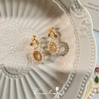 Retro Heart Shape Flower Alloy Plating Inlay Artificial Gemstones Pearl Women's Ear Clips 1 Pair sku image 17