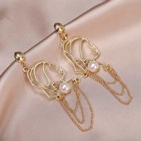 Fashion Human Face Alloy Pearl Hollow Out Women's Drop Earrings 1 Pair main image 3