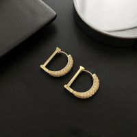 1 Pair Fashion Letter Inlay Copper Zircon Earrings main image 1