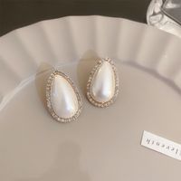 Elegante Oval Forma De Corazón Rosa Aleación Embutido Perlas Artificiales Diamantes De Imitación Mujeres Aretes sku image 18