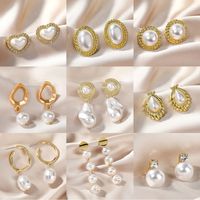 Fashion Oval Heart Shape Pearl Metal Rhinestones Earrings 1 Pair main image 1